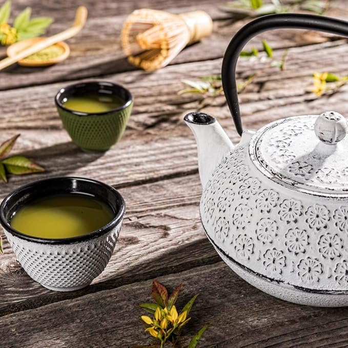 Restaurantware-30 Ounce Japanese Teapot, 1 Enamel Coated Japanese Tea Kettle - Cherry Blossom Design, Includes Mesh Strainer, White Cast Iron Primitive Kettle, For Teabags And Loose Leaf Tea