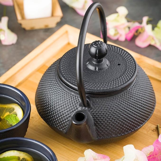 Restaurantware Tetsubin 20 Ounce Cast Iron Teapot 1 Hobnail Iron Teapot - With Strainer Retains Heat Black Cast Iron Japanese Tea Kettle Curved Handle